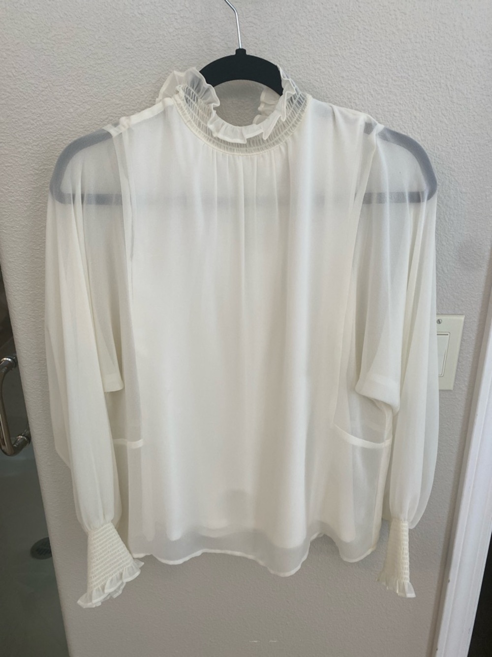 Elegant Ivory Ruffled High-Neck Blouse by Vince Camuto.